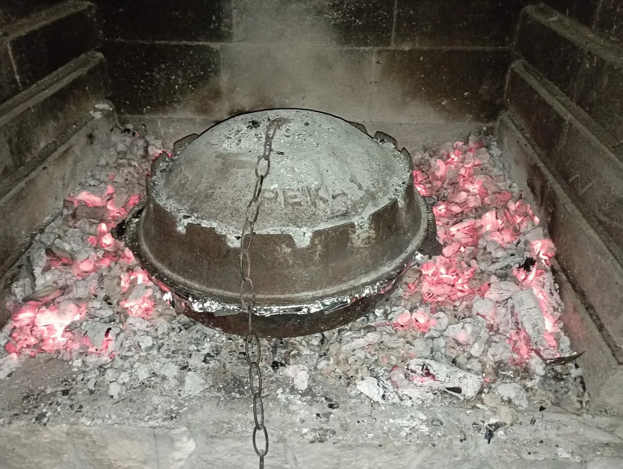 Peka: Croatia's Slow-Cooked Dish Under the Iron Bell