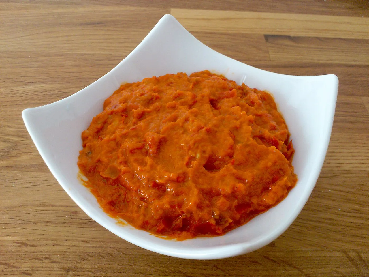 A bowl of ajvar, red pepper relish.