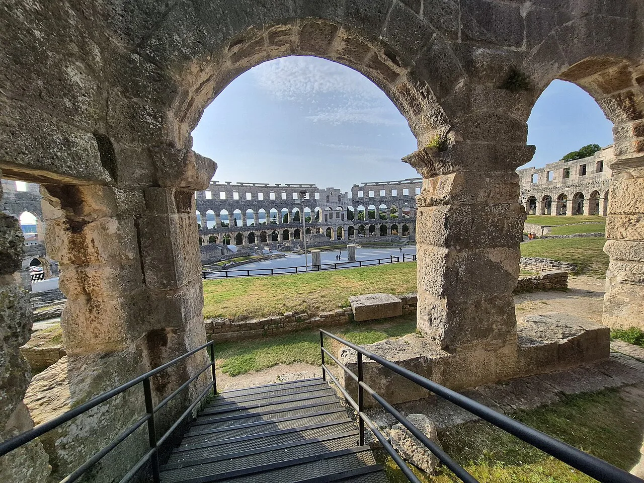 The Pula Arena seen through one of its arches.