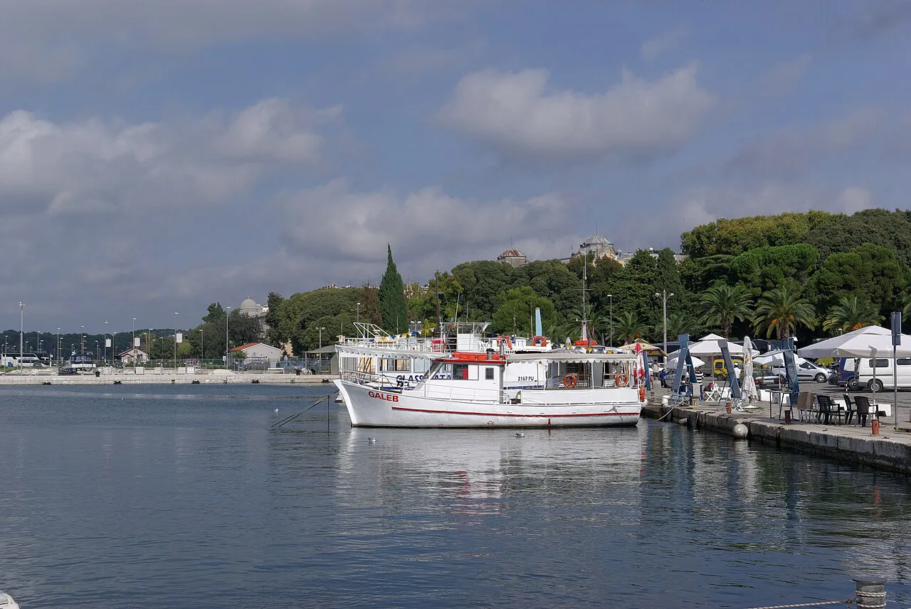 Boats along the harbour front, Pula.