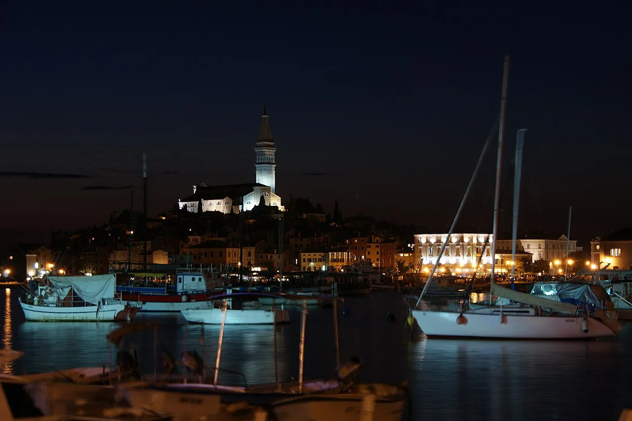 Rovinj's harbour and old town after sunset.