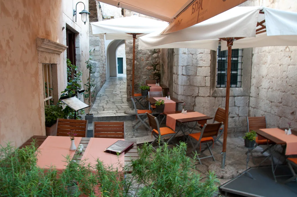 A small café terrace in Dubrovnik's old town.