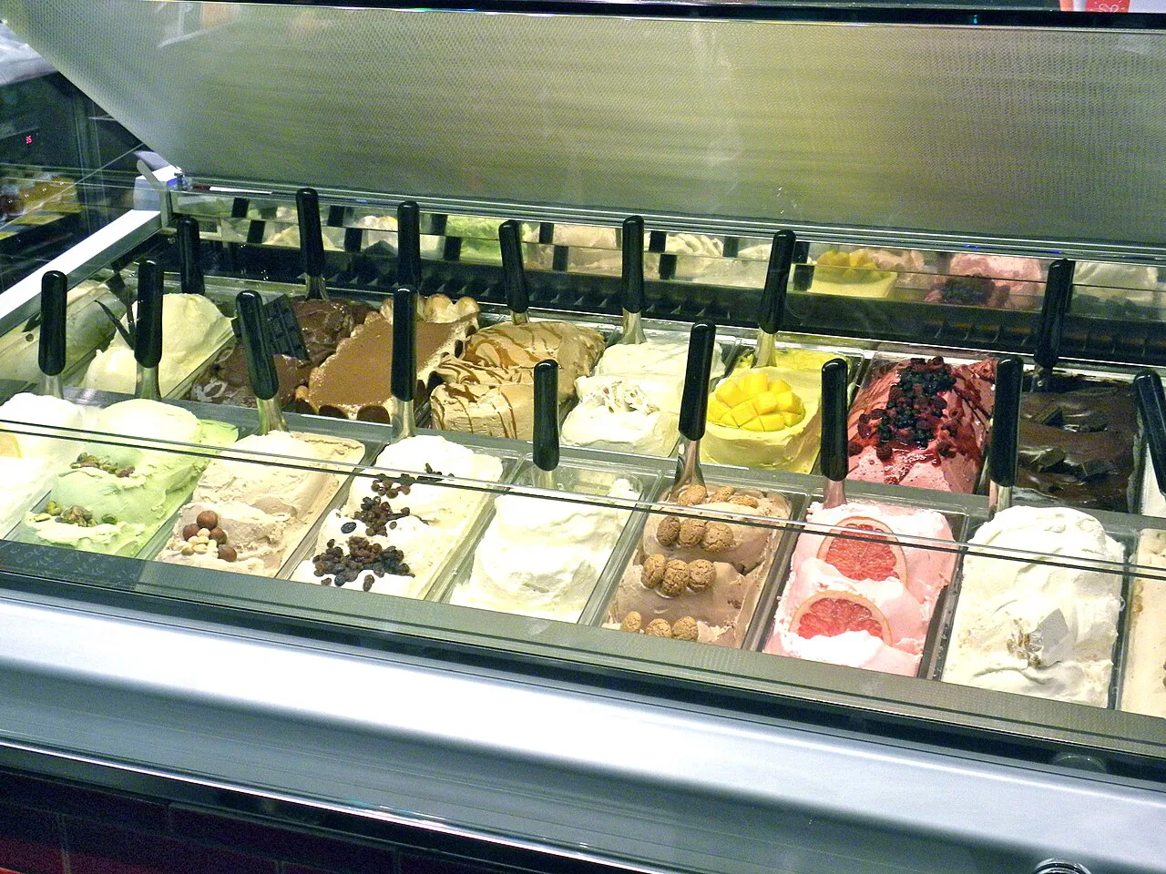 A counter of colourful gelato flavours.