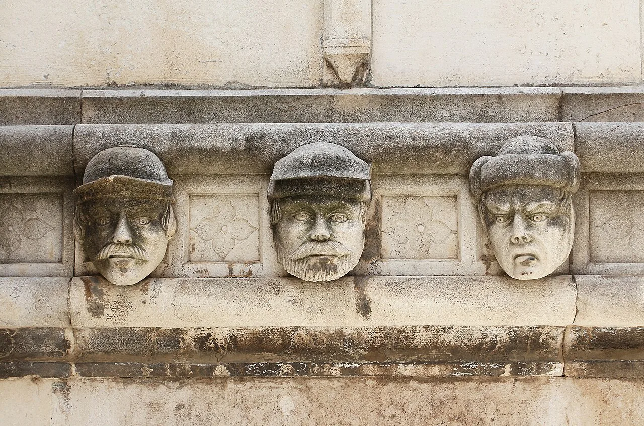 Carved heads on the Cathedral of St James, Šibenik.