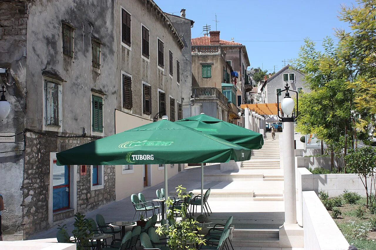 A café terrace on an old-town street in Šibenik.