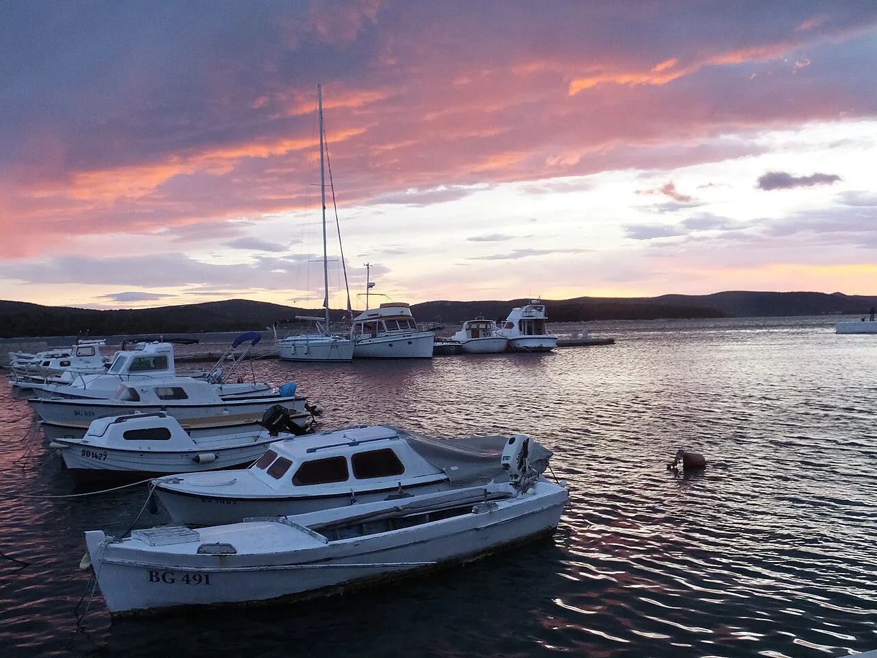 Boats in the harbour at sunset, Šibenik.