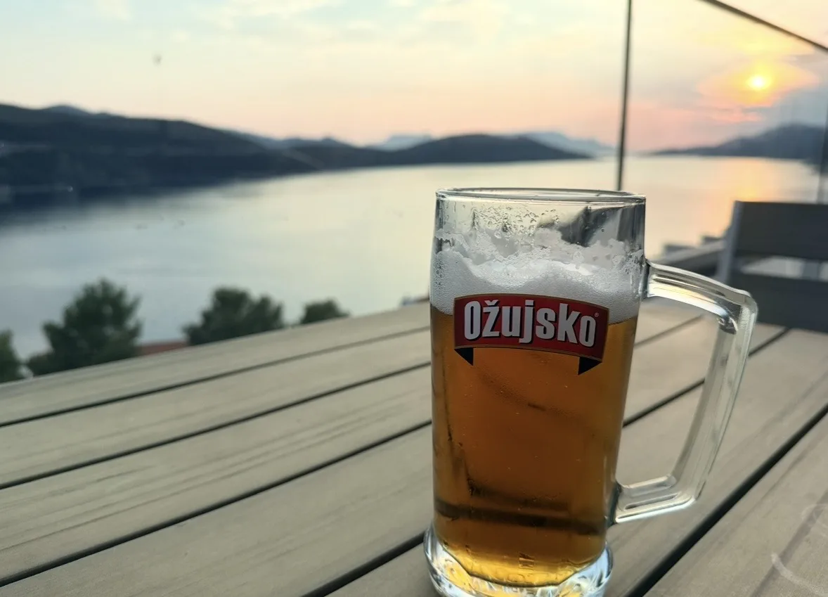 A glass of Ožujsko lager by the sea at Neum.