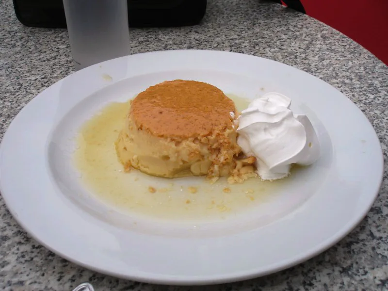 Rožata, a Croatian custard pudding, served with whipped cream.