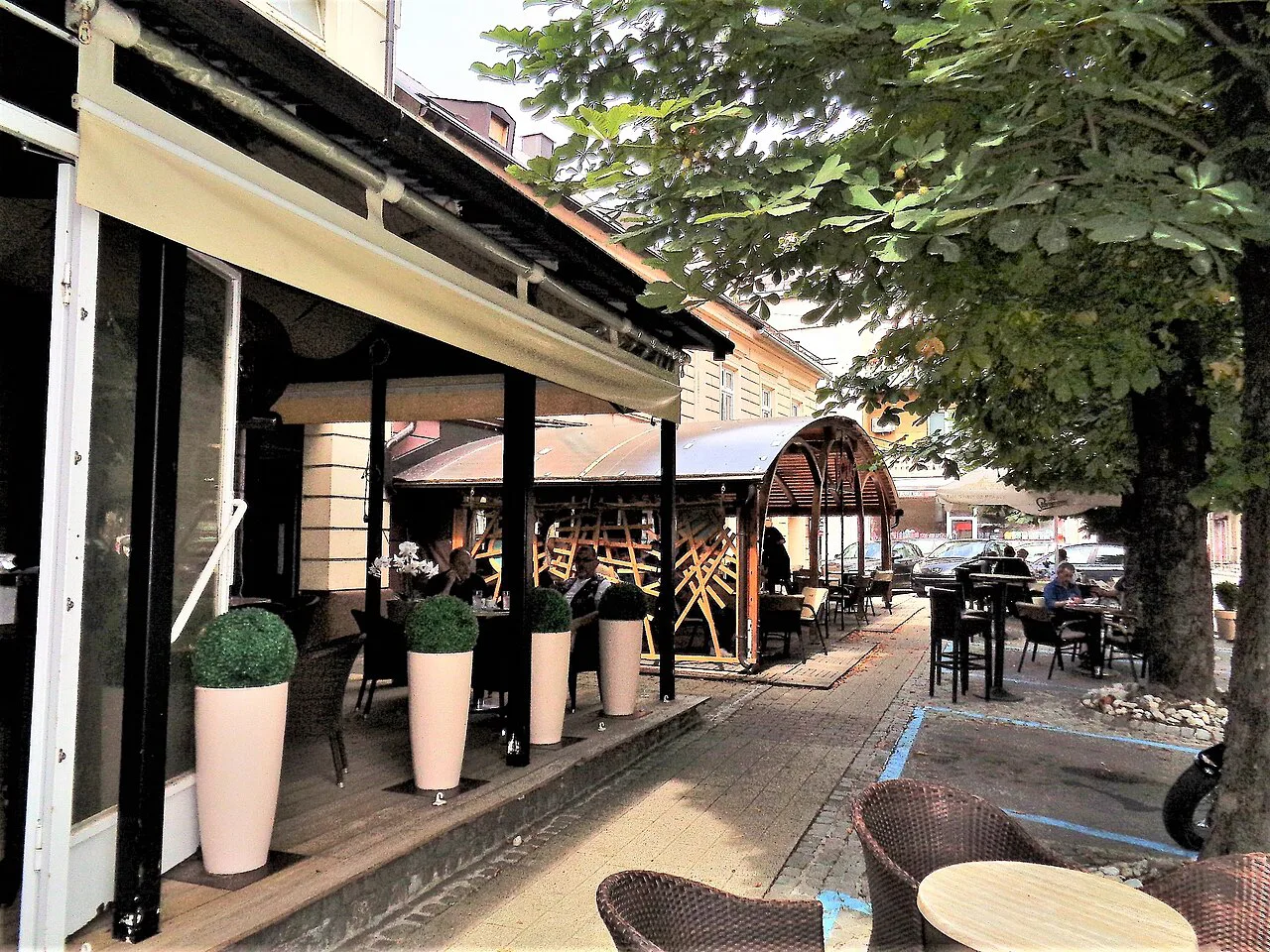 Café terraces along a street in the centre of Gospić.