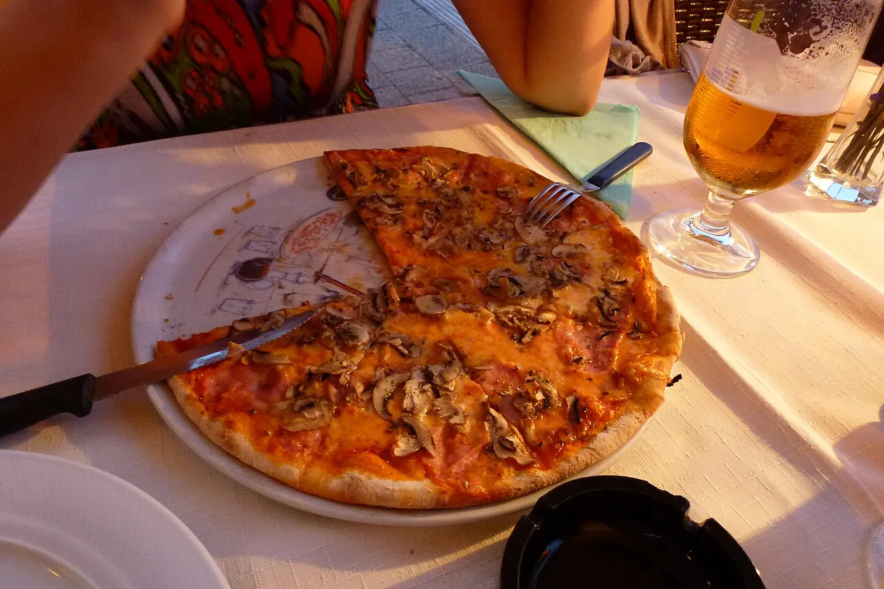 Pizza capricciosa at a restaurant in Vodice.