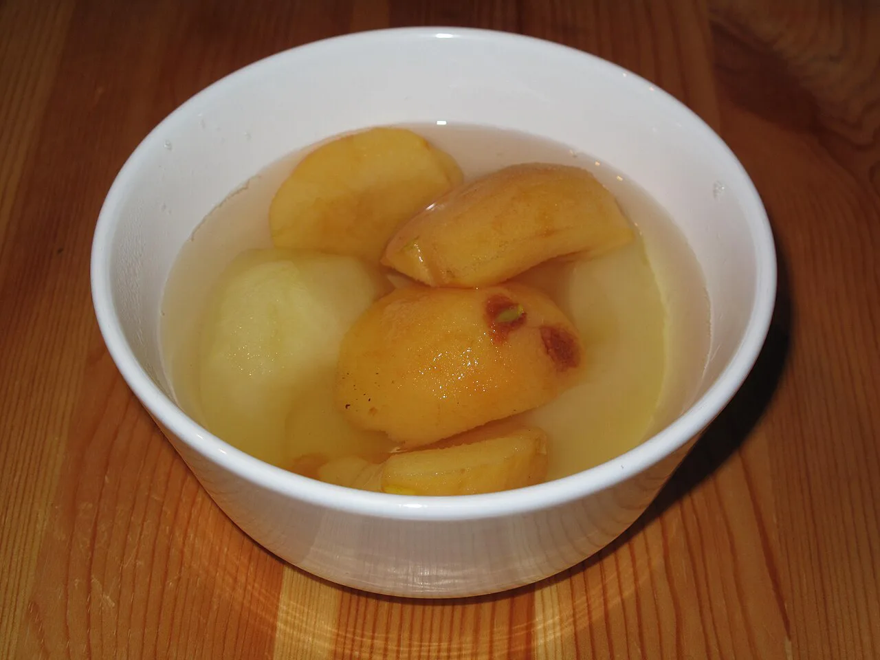 A bowl of apple and quince kompot.