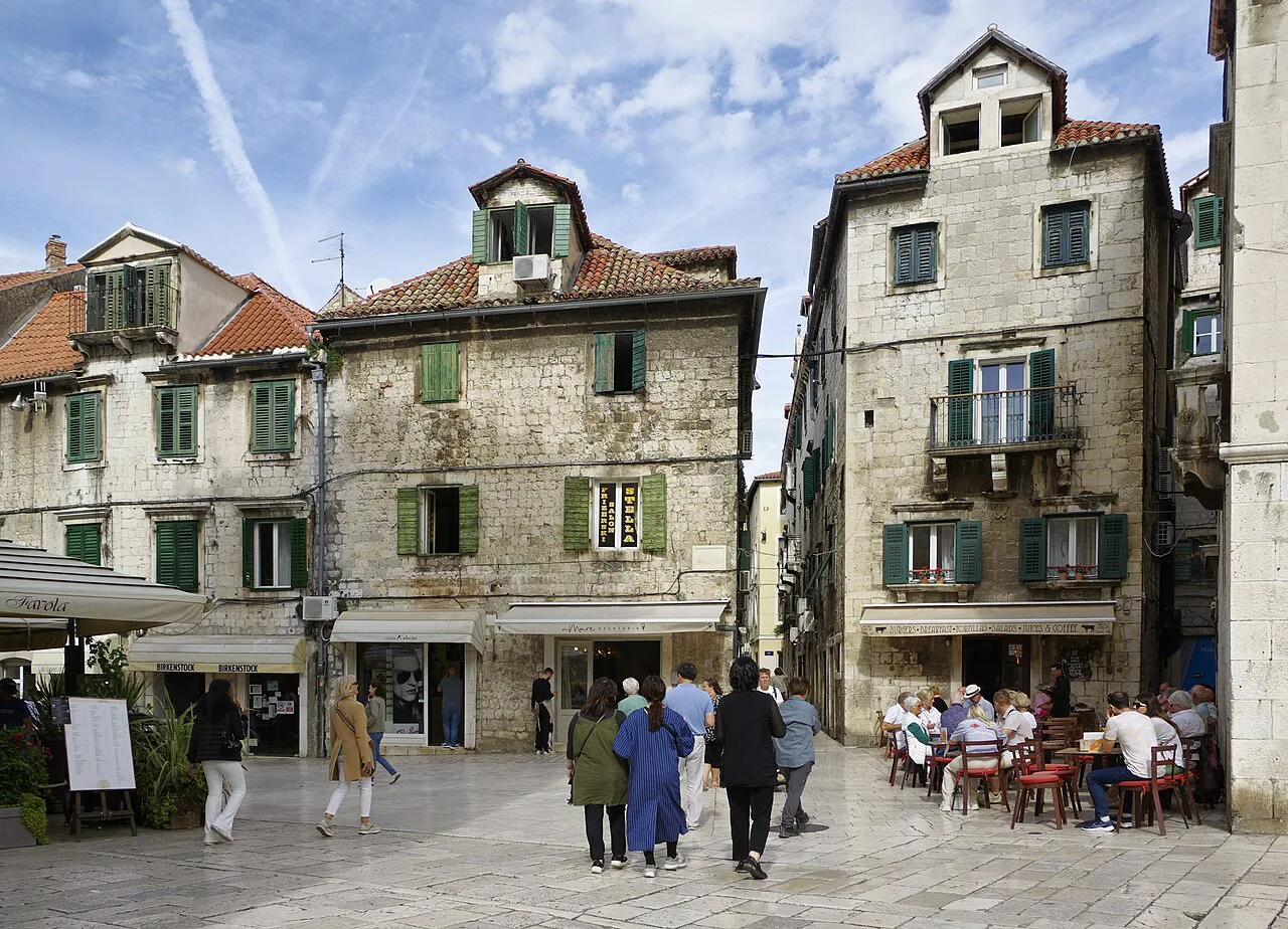 Café tables on Trg braće Radić in Split's old town.