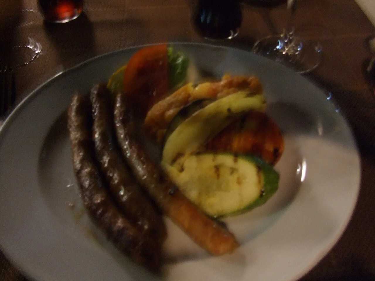 Homemade sausages with grilled vegetables and potatoes at Konoba Galija.