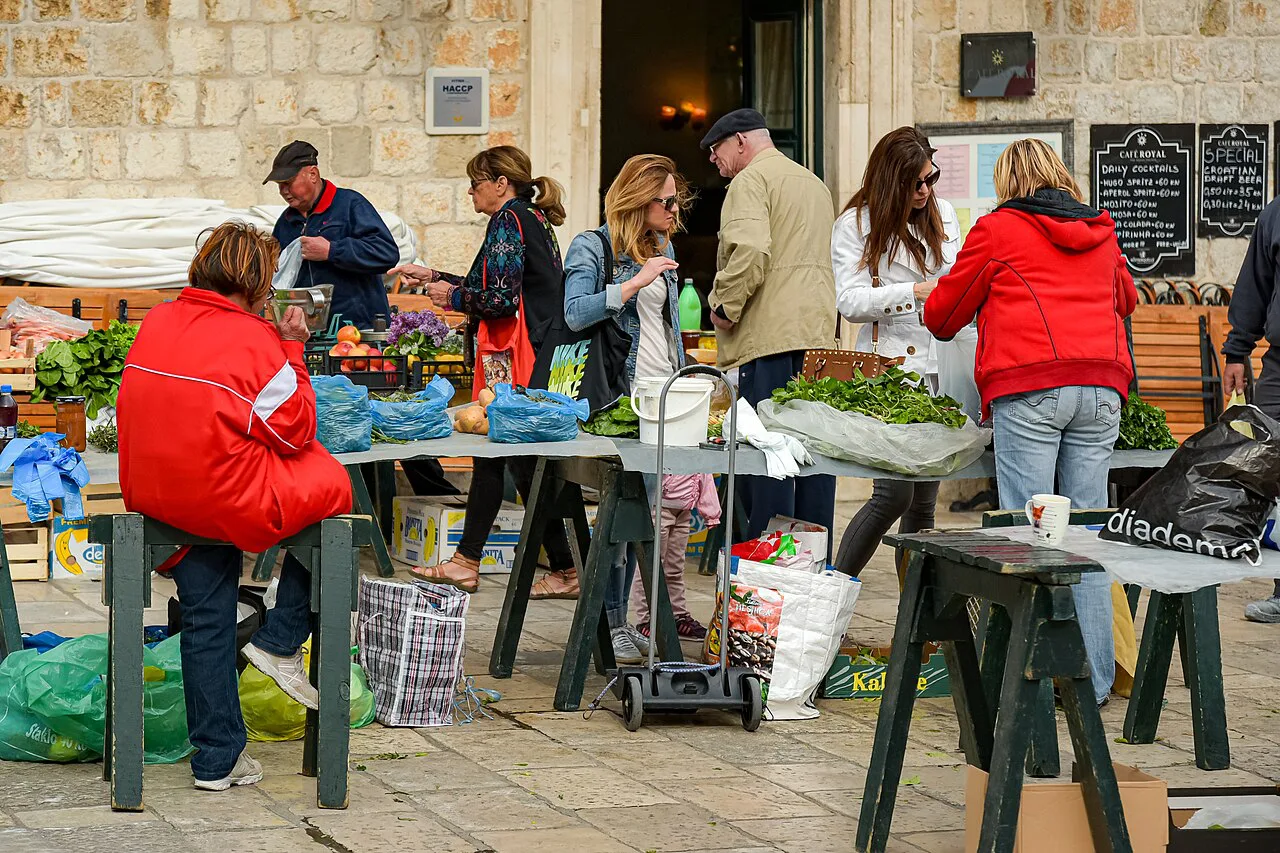 Shoppers at the produce stalls on Gundulićeva poljana, Dubrovnik.