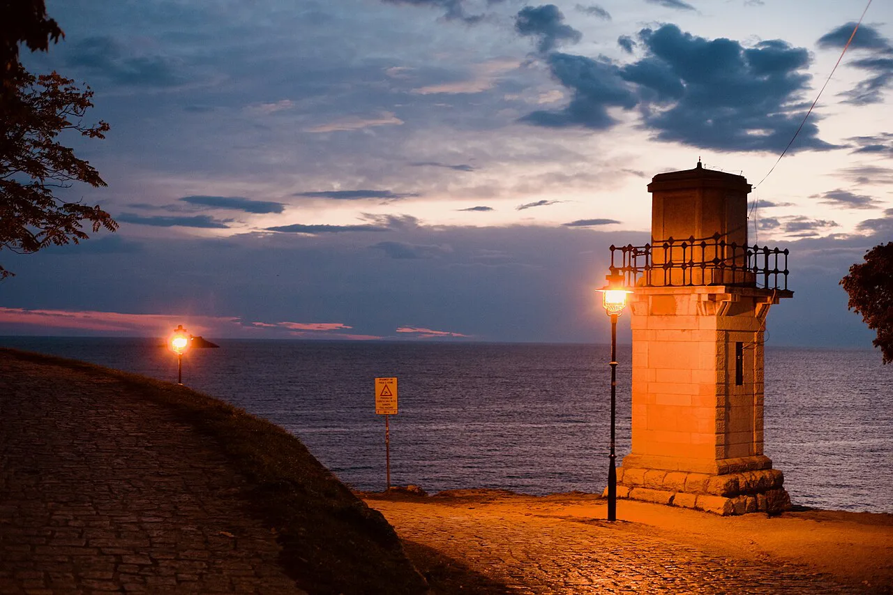 The harbour light on Rovinj's waterfront at sunrise.
