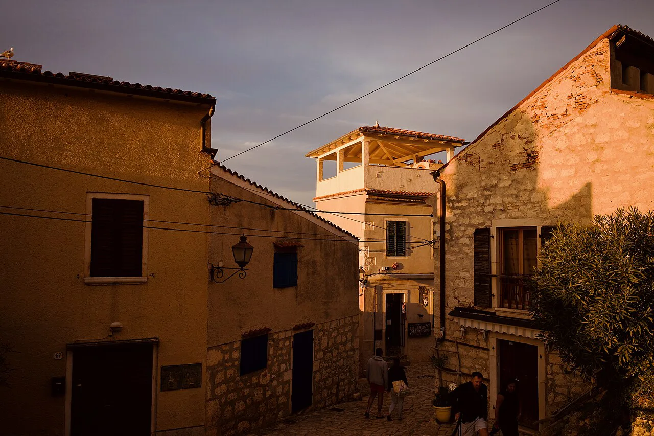 Old houses by the port in Rovinj at sunrise.