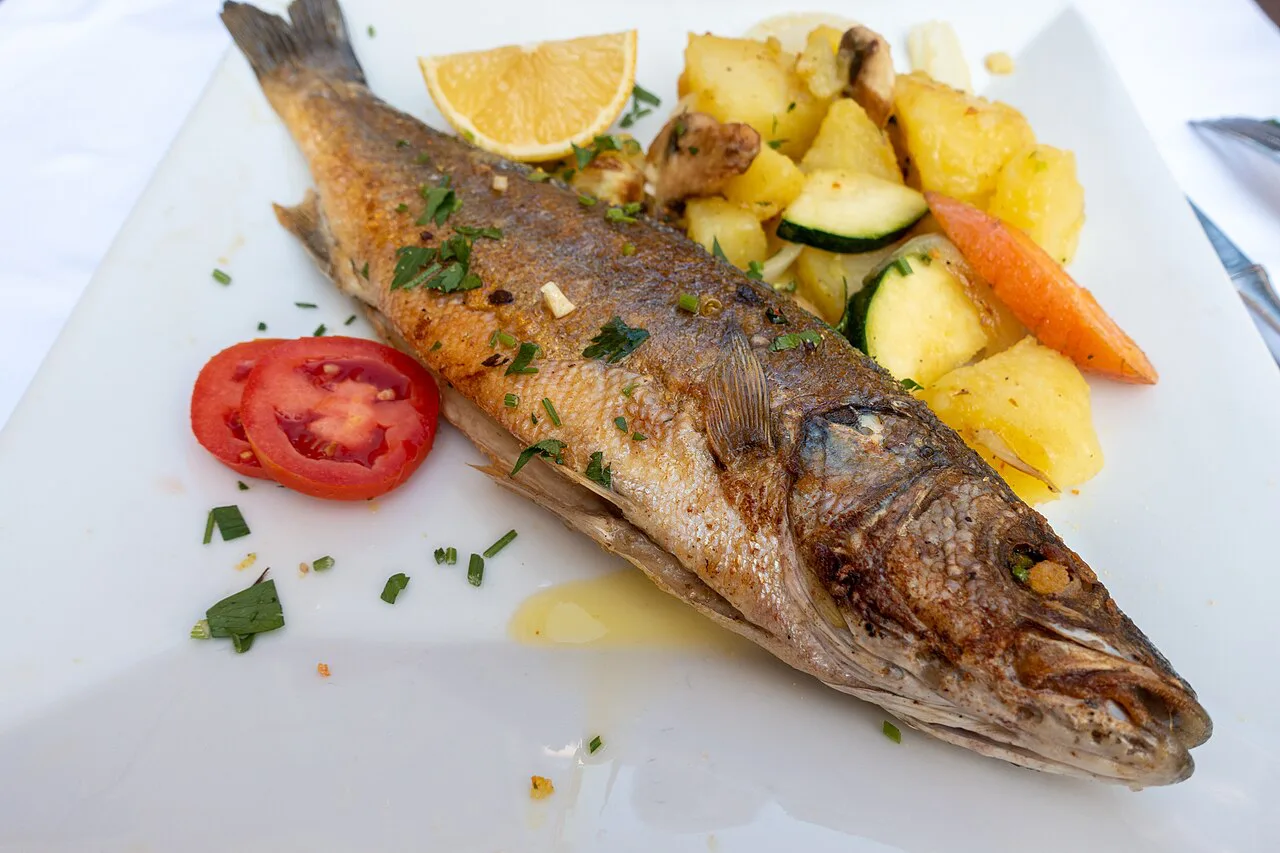 Grilled fish with roast vegetables.