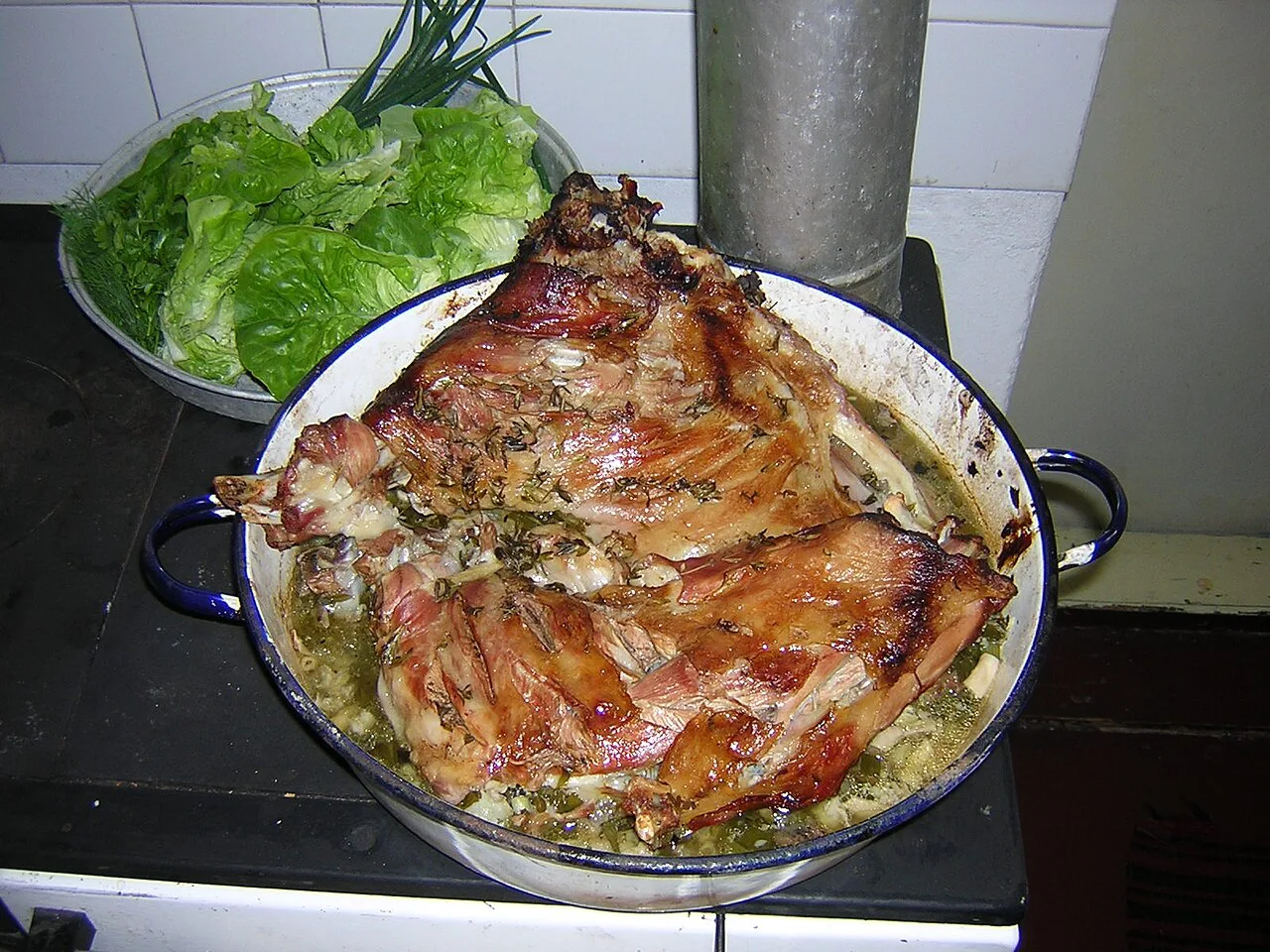 Roast lamb in a baking dish.