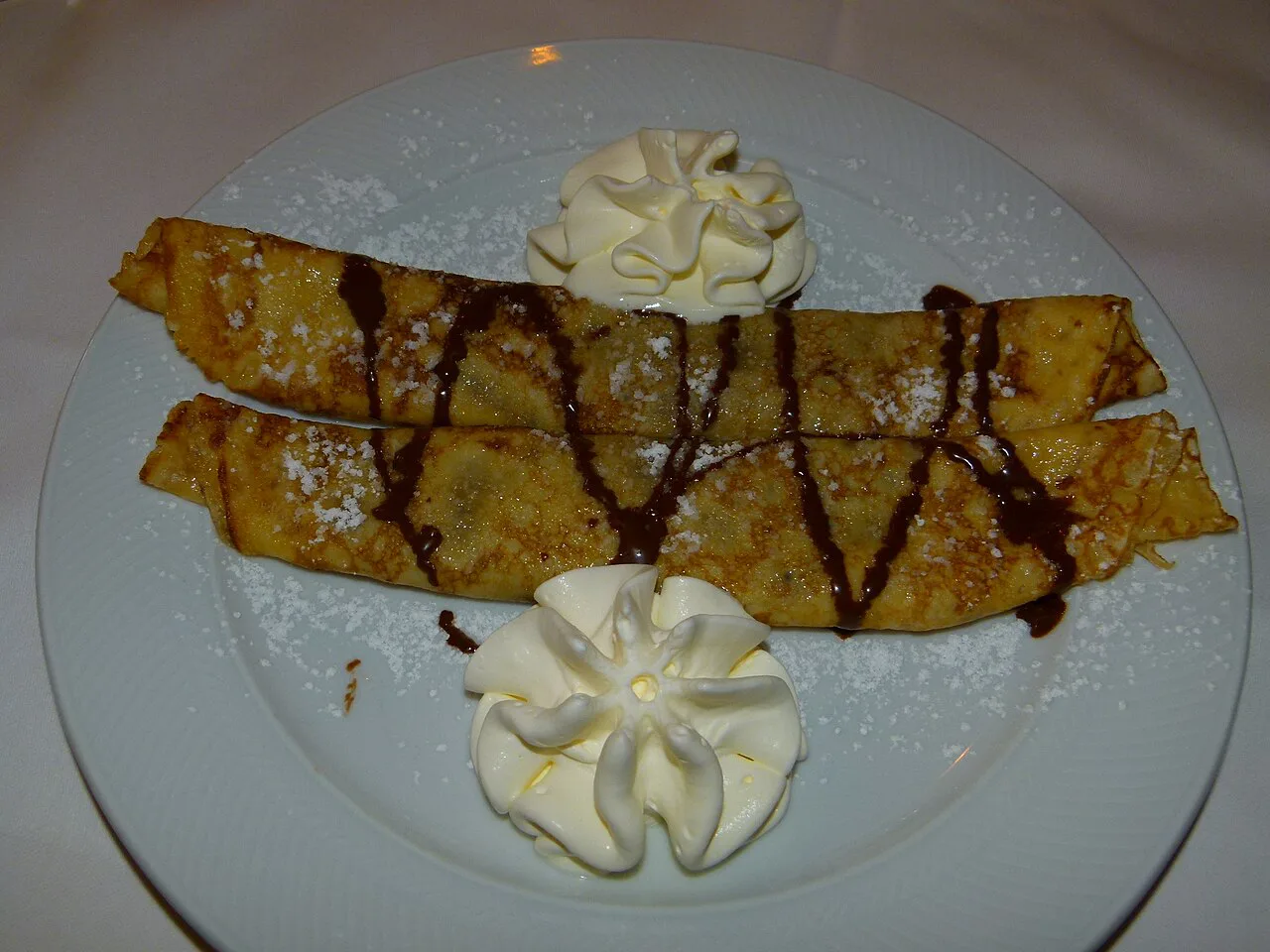 Palačinke with chocolate sauce and whipped cream, Vienna.
