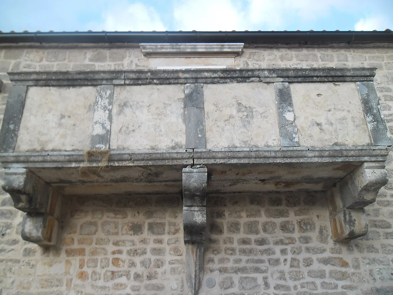 A carved stone balcony in Stari Grad, Hvar.