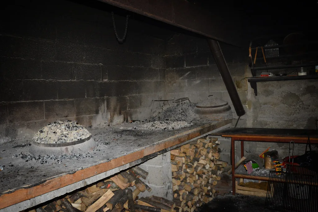 Dishes baking under a peka at Agrotourism Kalpic near Lozovac.