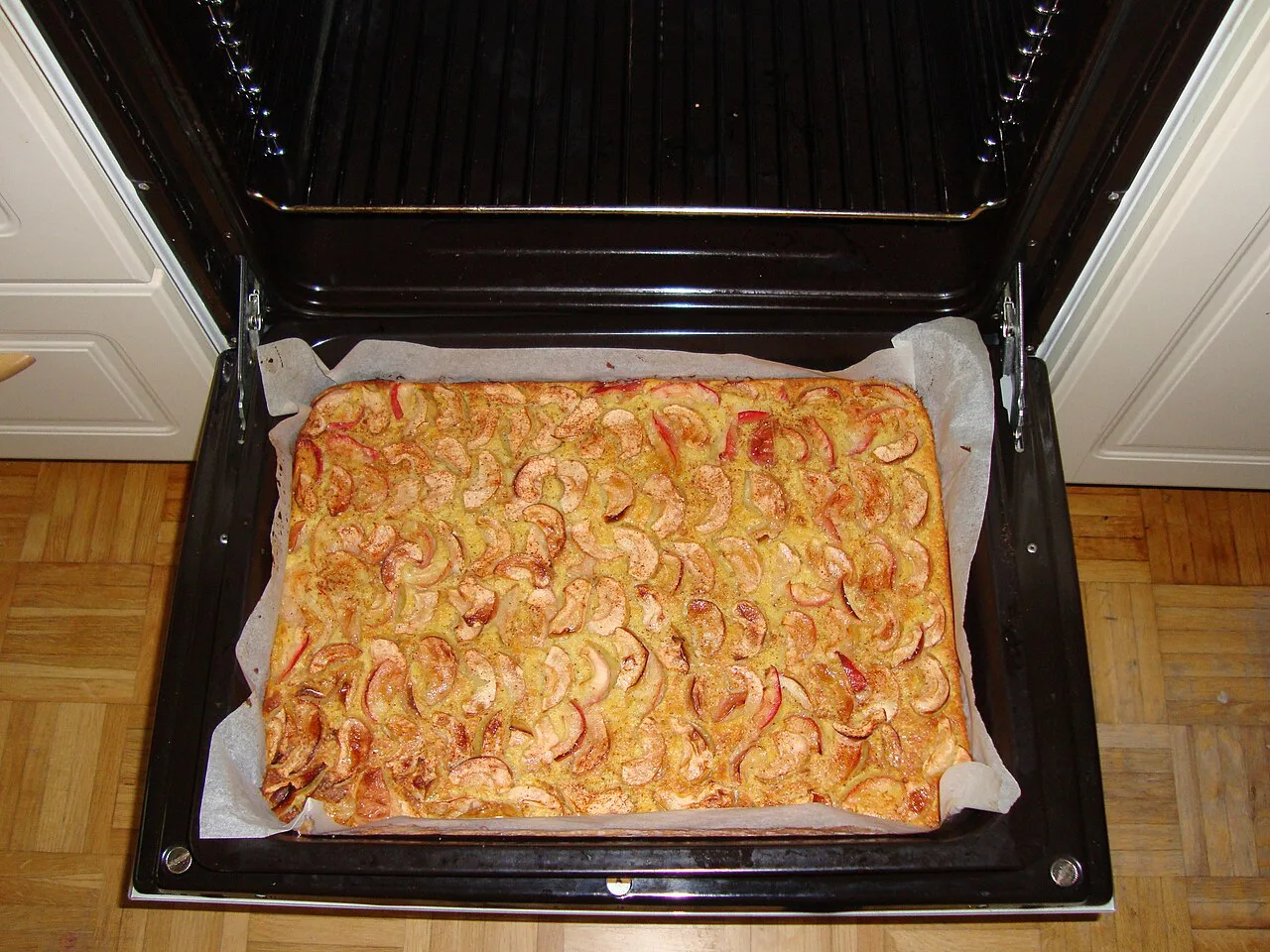 A tray of apple pie fresh from the oven.