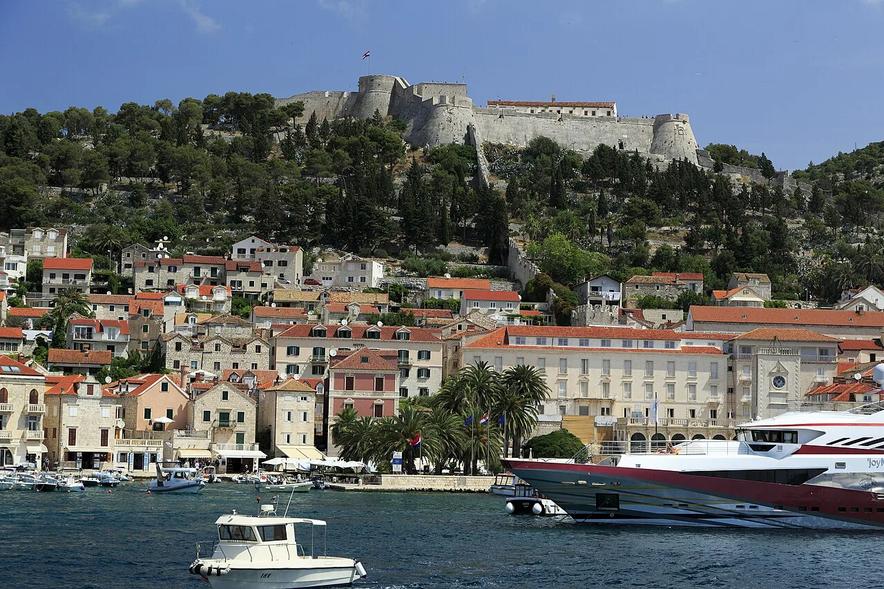 Hvar town harbour below the Fortica fortress.