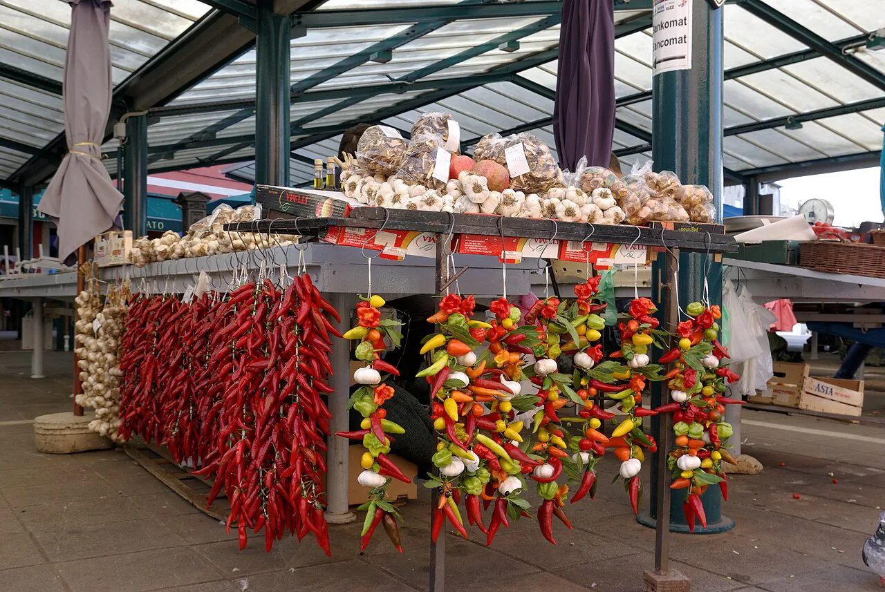 Strings of chilli peppers and garlic at the market in Rovinj.