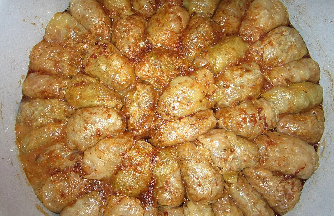 A dish of sarma cabbage rolls.