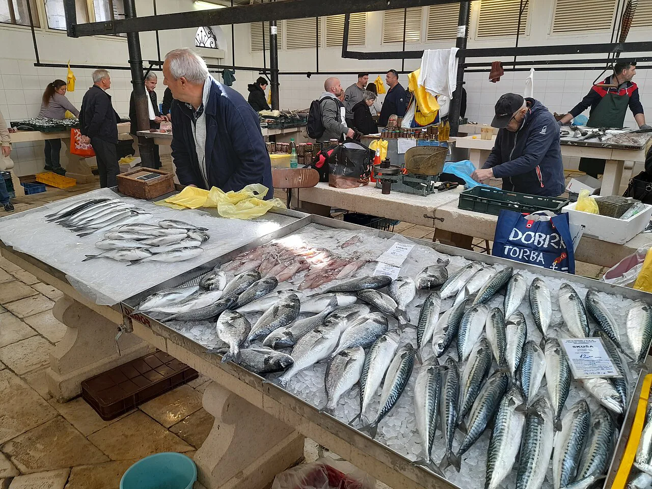 Sardines and other fish on sale at the fish market in Split.