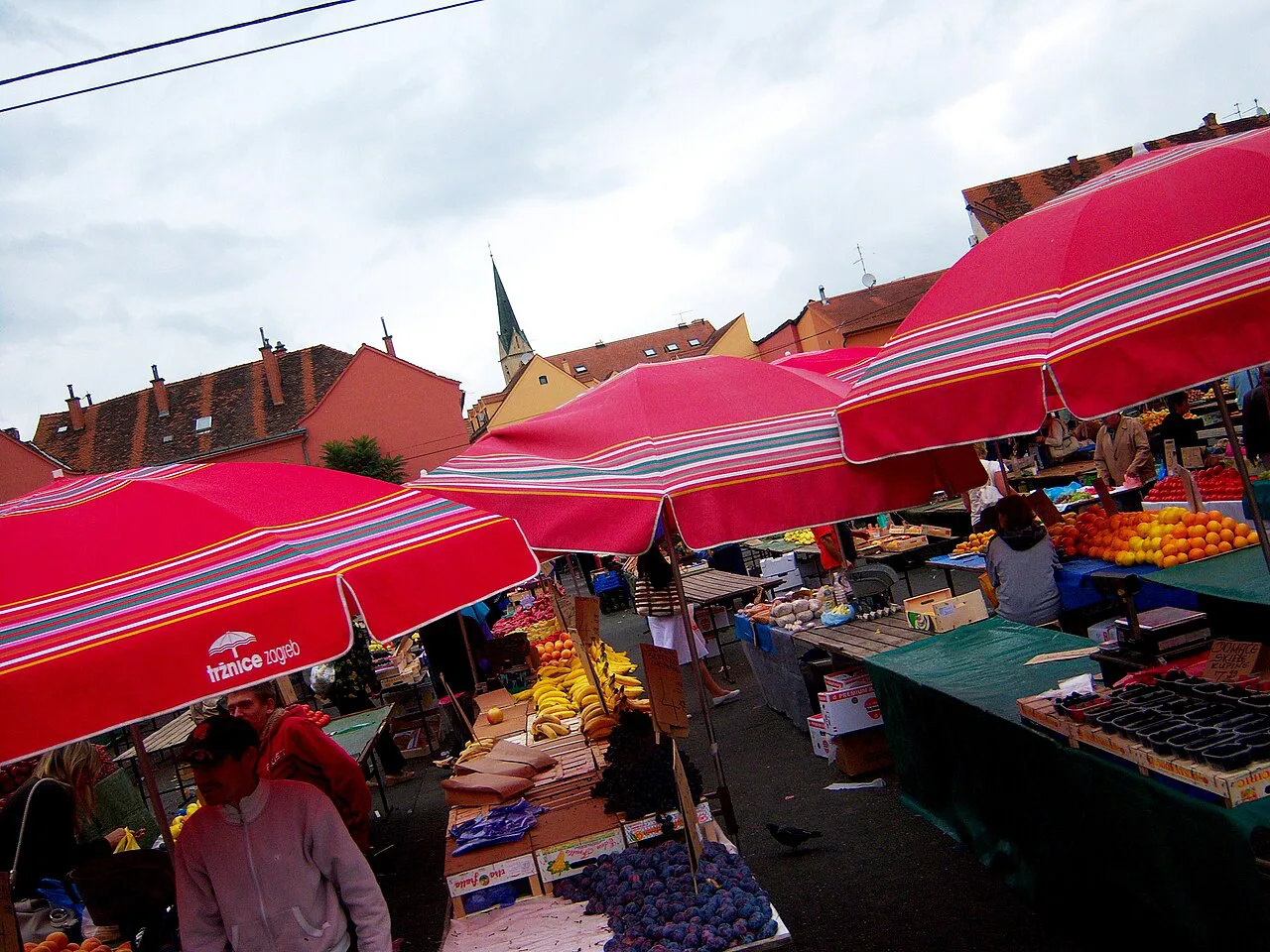 Red umbrellas over the stalls at Dolac Market, Zagreb.