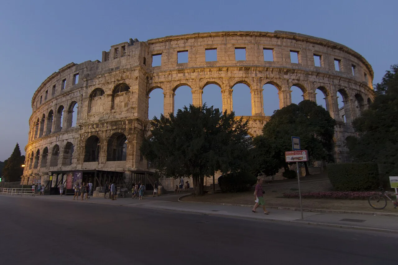 Pula Arena at dusk.