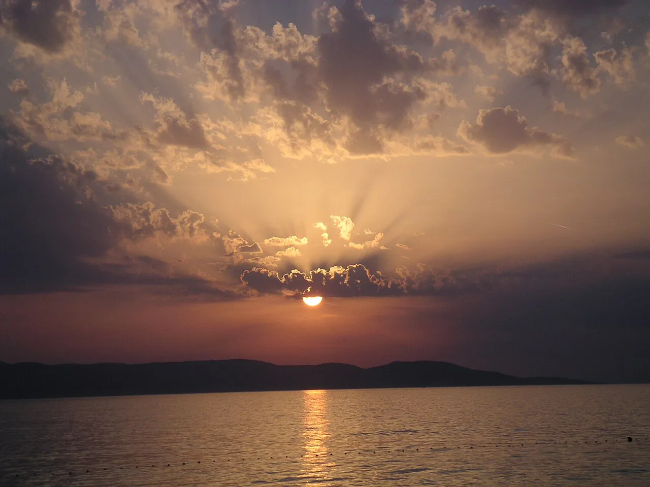 Sunset over the sea from Tučepi, with the island of Brač on the horizon.