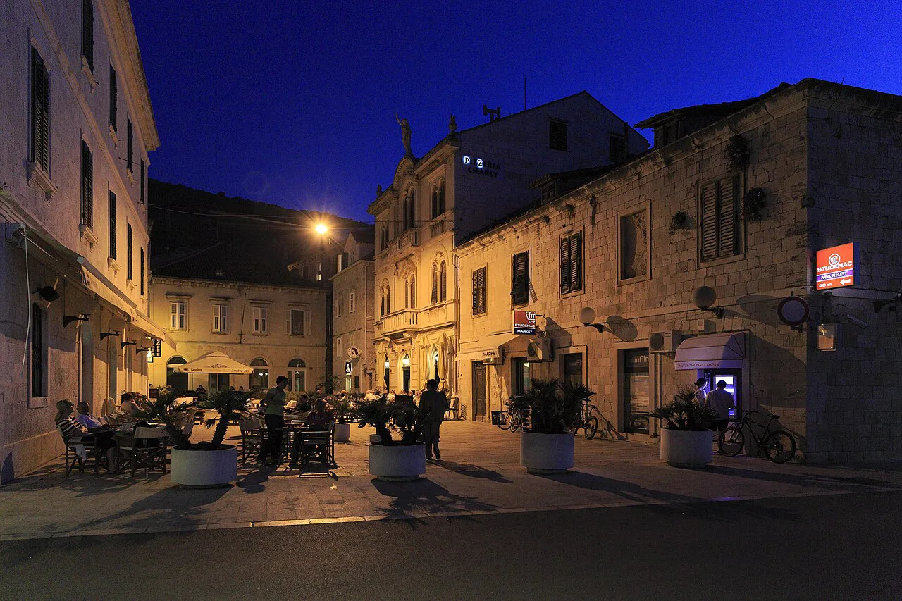 Terrace tables on Trg Klapavica at dusk, Vis.