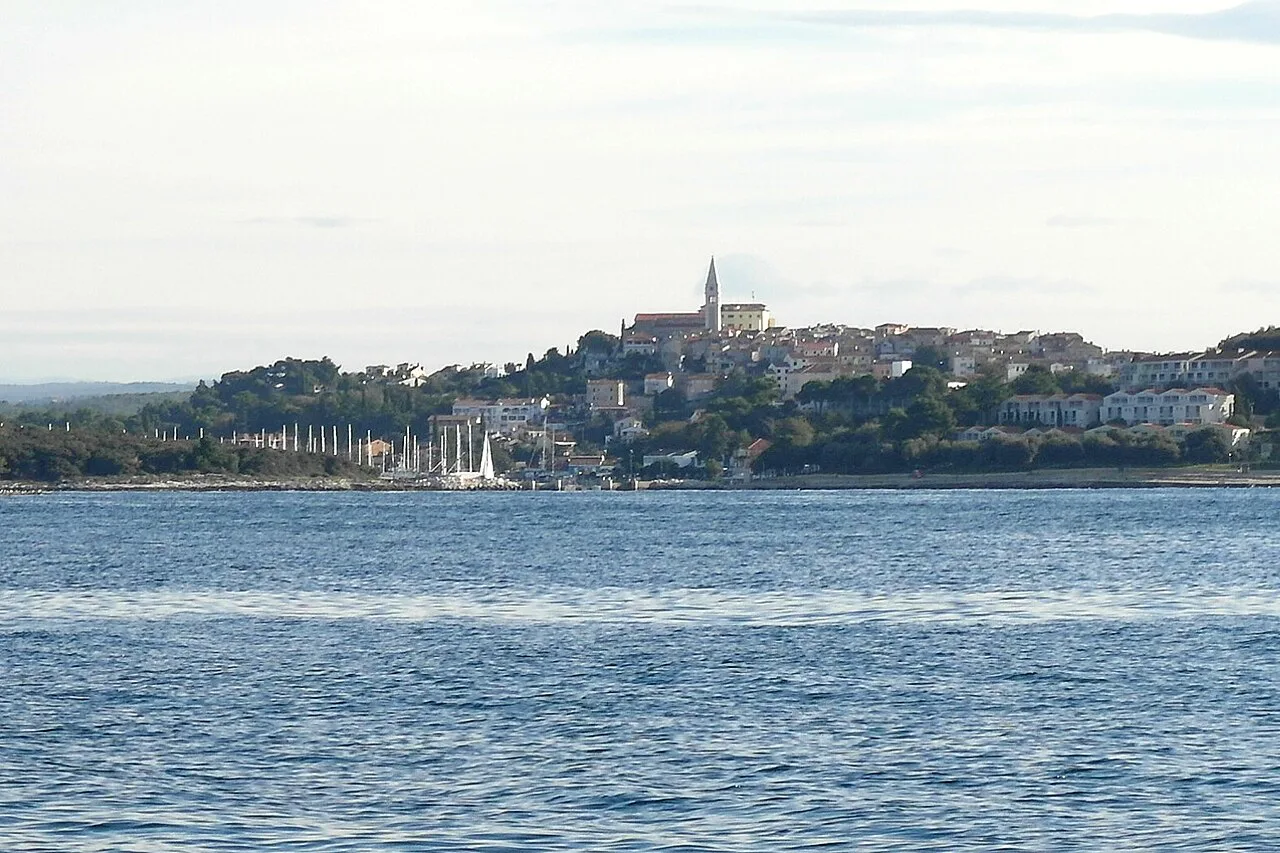 Vrsar seen across the water.