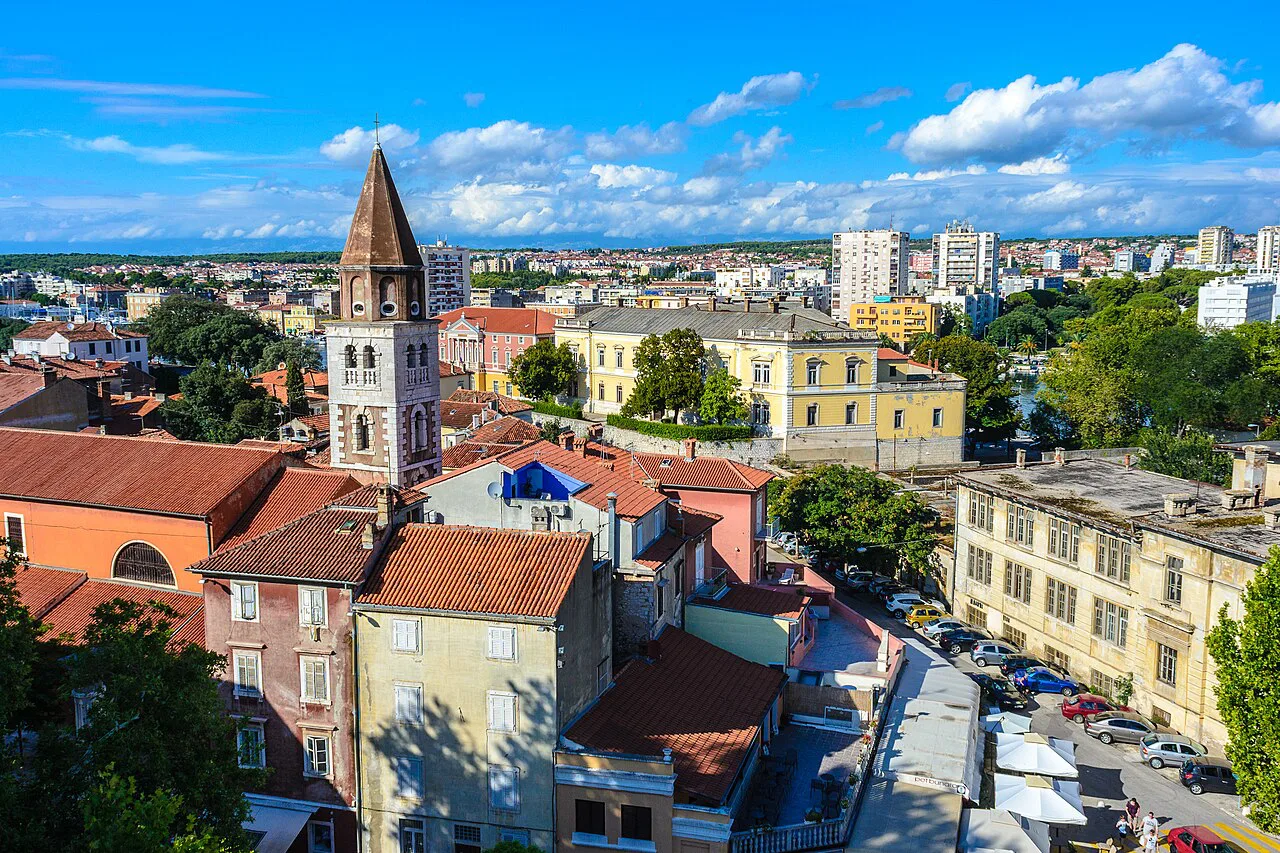 Zadar rooftops and a bell tower, seen from above.
