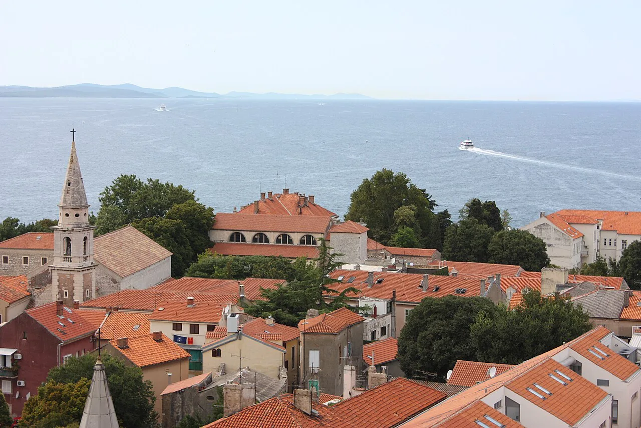 Rooftops and church towers of Zadar by the sea.